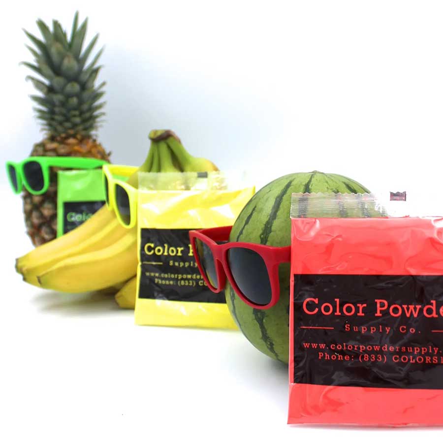 Powder packets with sunglasses and summer accessories